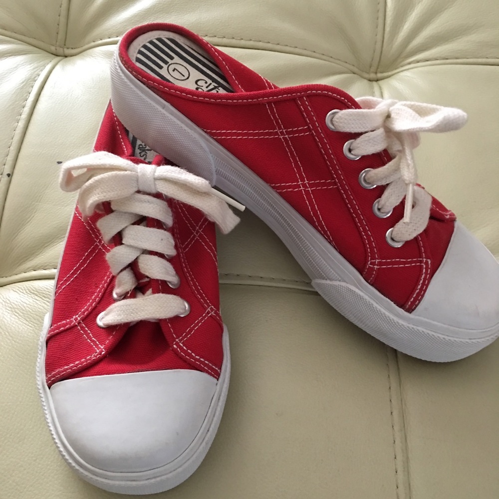 Maurice’s red sneakers